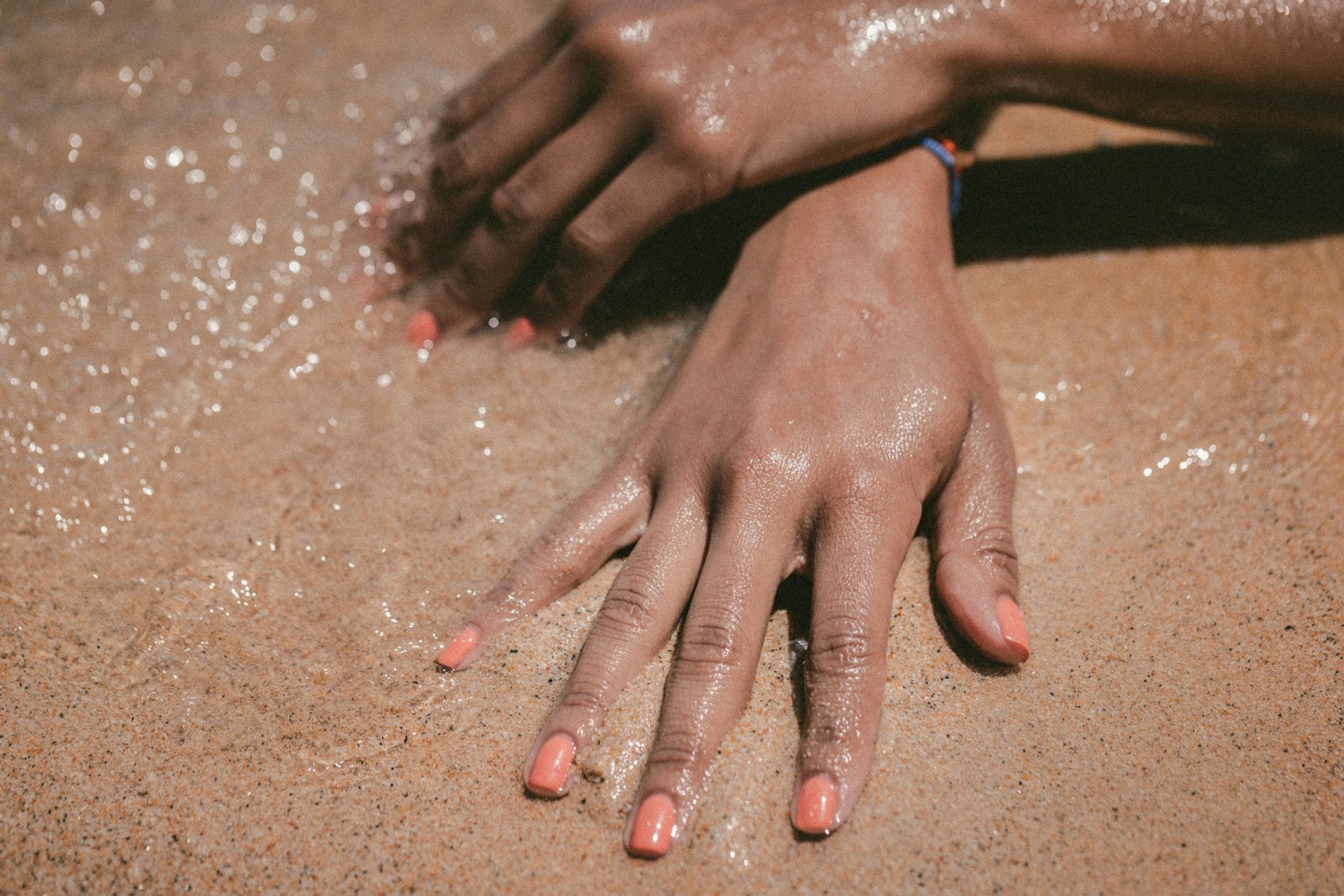 person hand showing nail polish